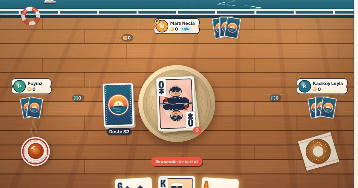 The pile on a tea tray on a ferry deck at sunset, with the cards in hand, in Pistivo